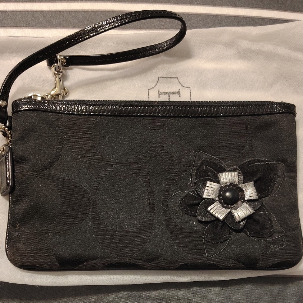 Coach Elegant Black Wristlet with Floral Accent